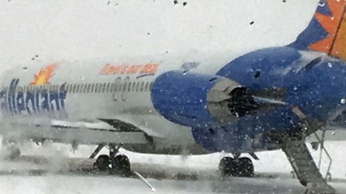 US passenger jet skids off icy runway