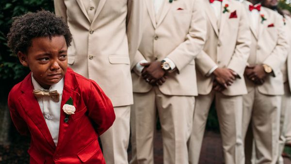 Little boy crying at wedding