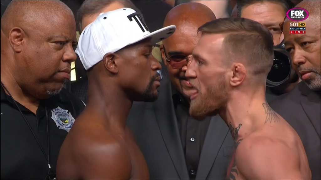 Mayweather and McGregor face off at the weigh-in