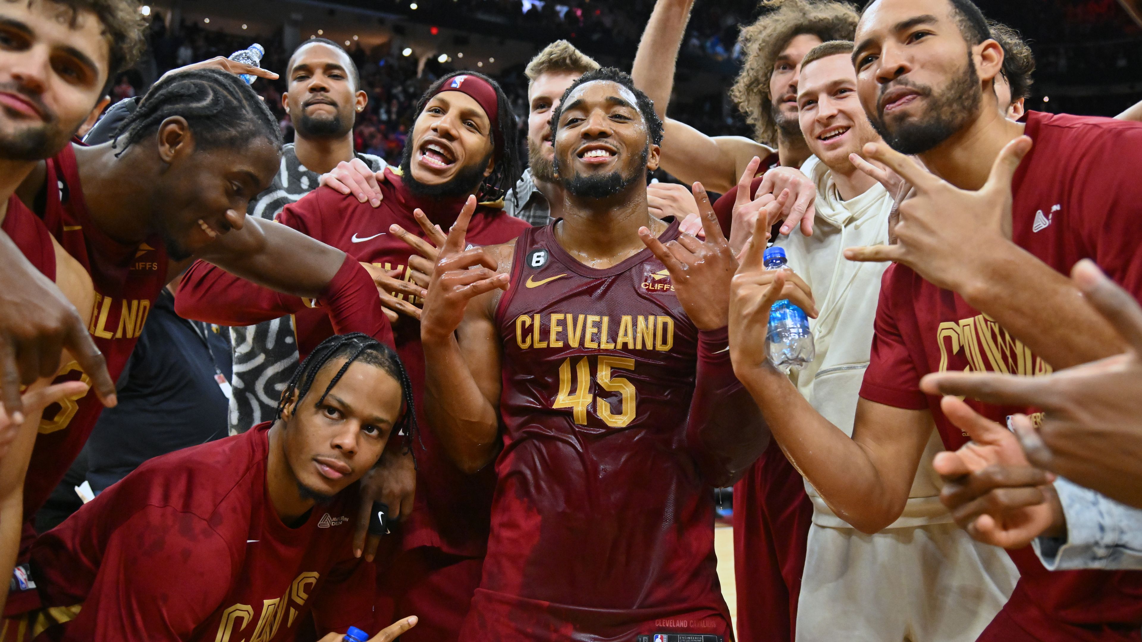 CLEVELAND, OHIO - JANUARY 02: Donovan Mitchell #45 of the Cleveland Cavaliers celebrates with his teammates after scoring a Cavaliers franchise record 71 points against the Chicago Bulls at Rocket Mortgage Fieldhouse on January 02, 2023 in Cleveland, Ohio. The Cavaliers defeated the Bulls 145-134. NOTE TO USER: User expressly acknowledges and agrees that, by downloading and or using this photograph, User is consenting to the terms and conditions of the Getty Images License Agreement. (Photo by J