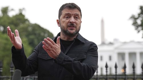 Ukraine's President Volodymyr Zelenskyy speaks in Lafayette Park, across from the White House, after meeting with President Donald Trump and European leaders Monday, Aug. 18, 2025, in Washington.