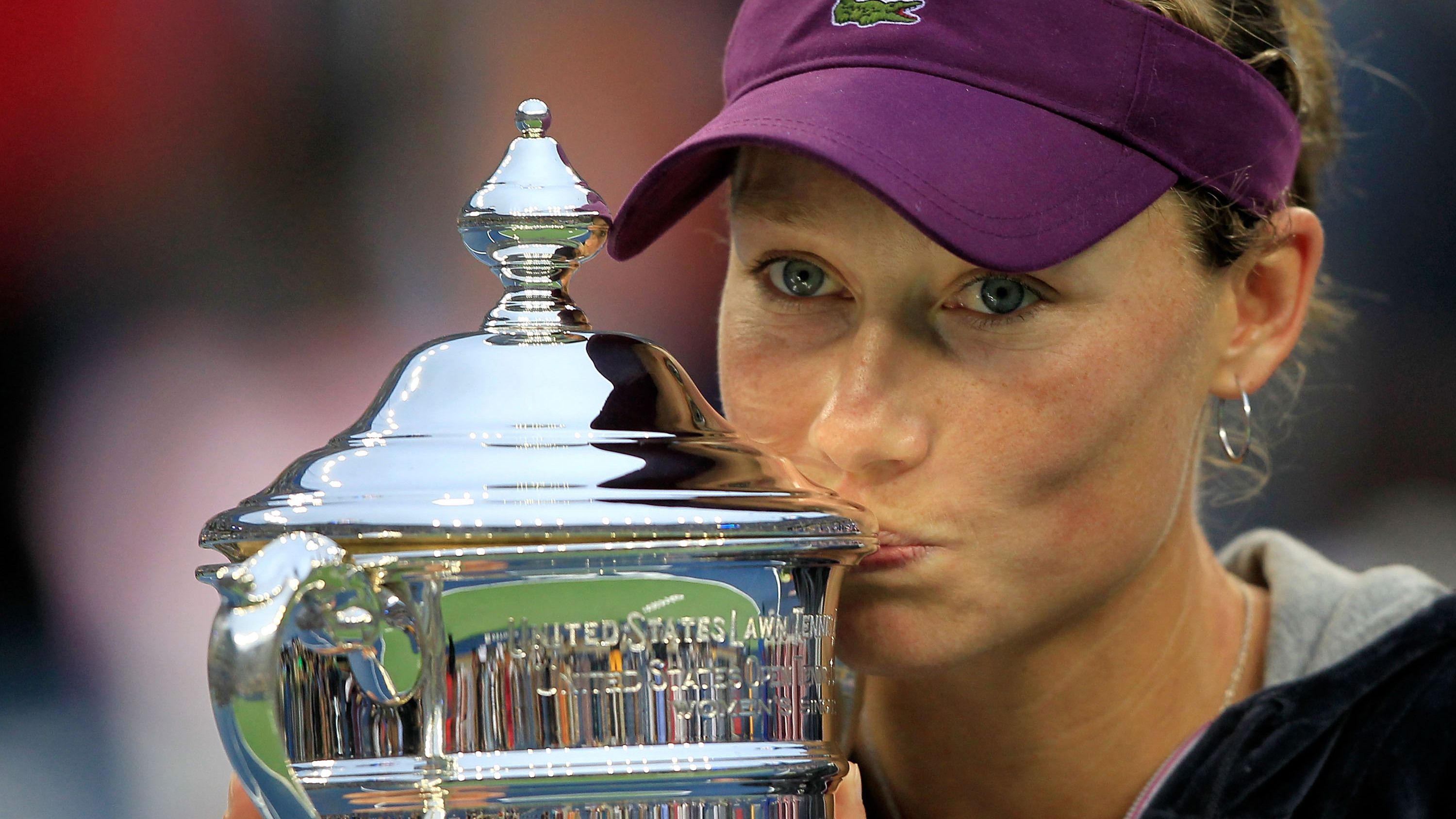 Samantha Stosur of Australia celebrates with the championship trophy after defeating Serena Williams of the United States to win the Women&#x27;s Singles Final on Day Fourteen of the 2011 US Open at the USTA Billie Jean King National Tennis Center on September 11, 2011 in the Flushing neighborhood of the Queens borough of New York City. (Photo by Chris Trotman/Getty Images)