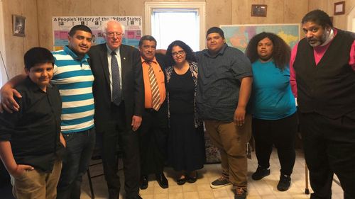 Jose Chicas (fourth from left) with Senator Bernie Sanders.