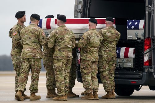 An Army carry team loads the transfer case containing the remains of U.S. Army Sgt. Kennedy Ladon Sanders, 24, of Waycross, Ga., to a vehicle along with the remains of Sgt. William Jerome Rivers, 46, of Carrollton, Ga., and Sgt. Breonna Alexsondria Moffett, 23, of Savannah, Ga., at Dover Air Force Base, Del., Friday, Feb. 2, 2024. 