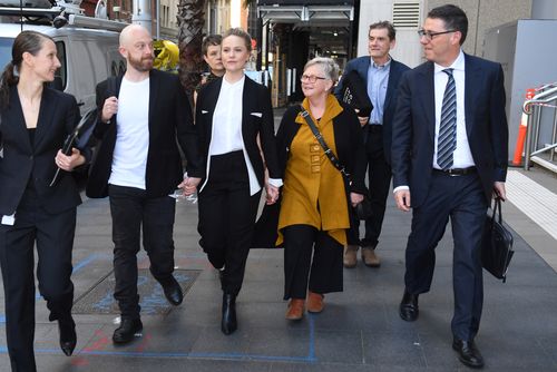 Eryn Jean Norvill (centre) is giving evidence in the defamation case between Geoffrey Rush and Nationwide News.