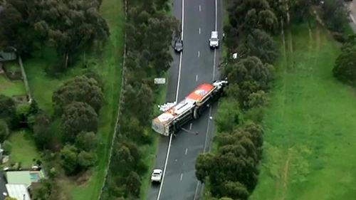 A truck has rolled on Melbourne's Metropolitan Ring Road. (9NEWS)