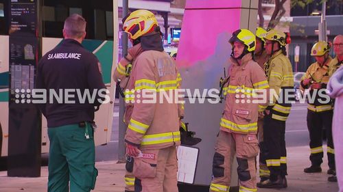 The man allegedly walked onto a chartered coach, with about 40 passengers on it, and tried to drive it away on Franklin Street in Adelaide at 5.54am.