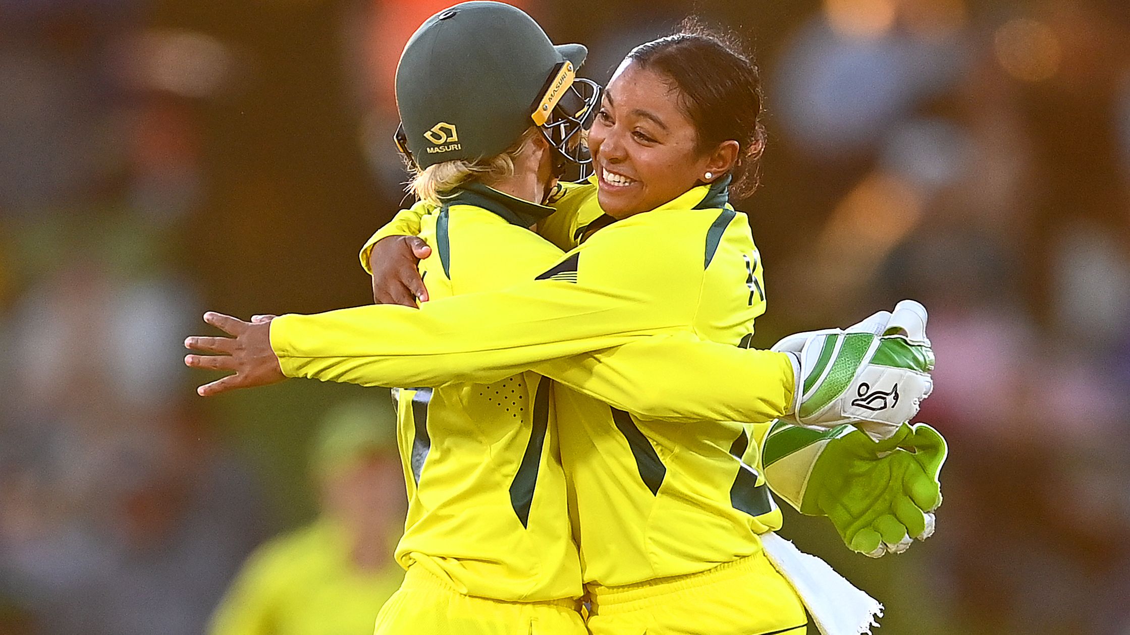 Alana King of Australia celebrates with Alyssa Healy after dismissing Heather Knight of England.