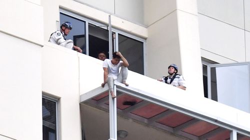 The man was on the balcony for more than 12 hours. (9NEWS)