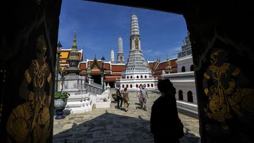 Tourists visit Grand Palace in Bangkok, Thailand on Monday.