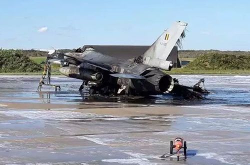 The burnt-out Belgian Air Force F-16 after it was accidentally hit by cannon fire at Florennes Air Base in the country's south.