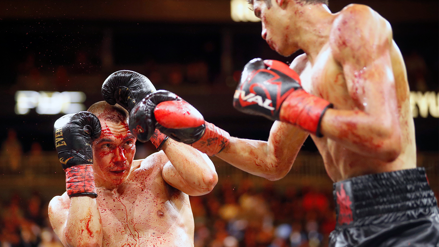Tim Tszyu battles against Sebastian Fundora during their 12-round title fight at T-Mobile Arena.