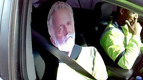 Driver busted using cutout of beer ad actor to cheat carpool lane