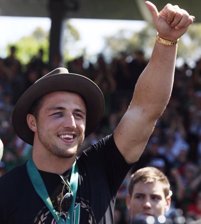 Burgess gives the fans a thumbs up.