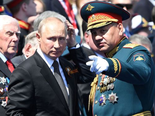 Vladimir Putin and Russian Defence Minister Sergei Shoigu during the 2012 Victory Day military parade.
