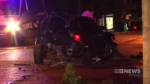 The Mazda 3 was severely damaged. (9NEWS)