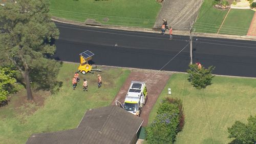 Woman hospitalised after falling into freshly laid hot tar in Sydney