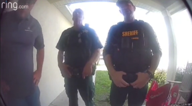 Ring camera captures moment policemen show up at door.