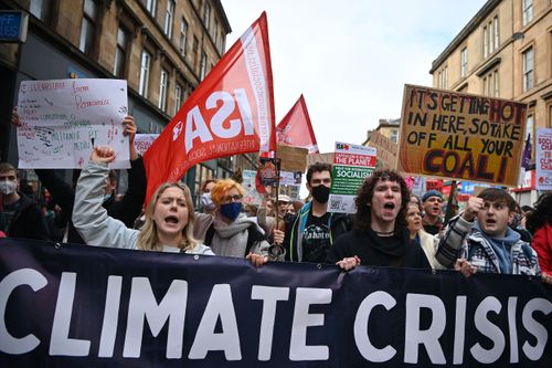 Youth activists march to protest against climate inaction on the sidelines of the COP26 UN Climate Summit in Glasgow