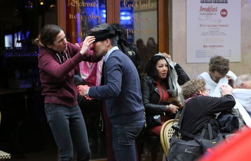 Injured victims of the Paris bakery blast receive first aid.