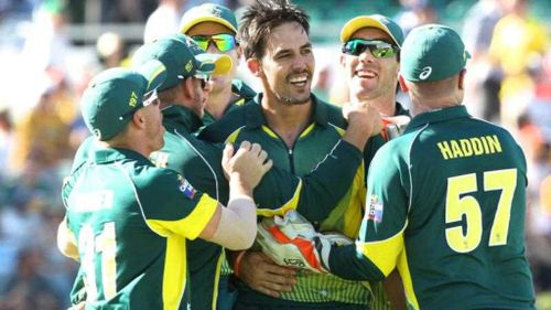 Mitchell Johnson celebrates taking the wicket of England captain Eoin Morgan during the Final of the One Day International Tri-Series between Australia and England at the WACA, Perth. (AAP)