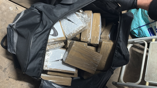 Police have raided a home and a nearby unit in one of Sydney's most exclusive suburbs after a man allegedly attempted to collect 30kg of cocaine from a car park. The 40-year-old allegedly attended a dead drop, a secret location where cash and illicit drugs are left for people to collect, in Alexandria yesterday.
