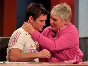 Shane Crawford with breast cancer survivor, Olympian Raelene Boyle, after his charity run in 2010.