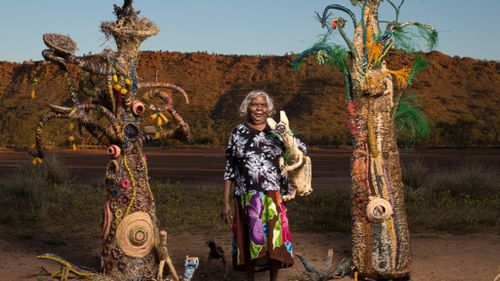 The Tjanpi Desert Weavers, which encourages women earn independent income from creating artwork, is just one of Ms Mason's NPY projects. (Tjanpi Desert Weavers)