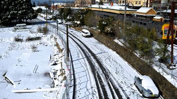 Snow covered the railway tracks at the Blue Mountains on Saturday. 