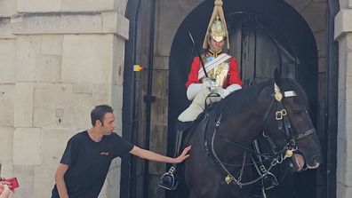 King's Guard's touching gesture for tourist