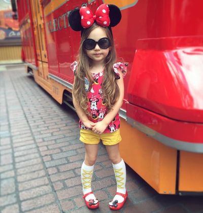 <strong>6. Atalie</strong> is a sweet little child model with a penchant for Disney themes and oversized shades.