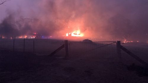 Firefighters worked overnight to protect a number of properties in coastal communities around Shoalhaven.