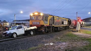 A﻿ ute has been hit by a train and pushed along the tracks in Devonport in Tasmania&#x27;s north west.