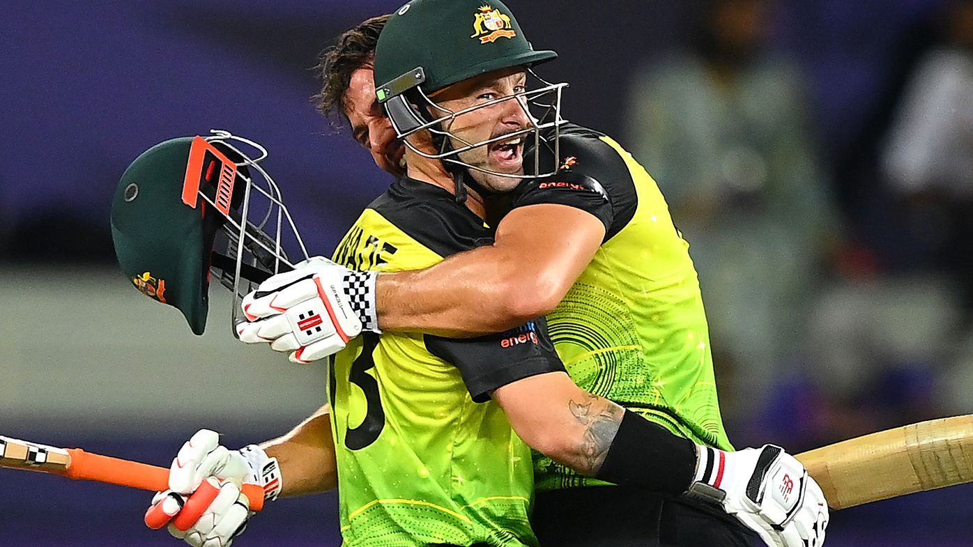 Matthew Wade and Marcus Stoinis celebrate Australia&#x27;s T20 World Cup semi-final win.