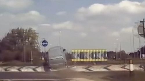 A van in the UK has catapulted over a roundabout at speed, flying through the air in a gravity defying crash.