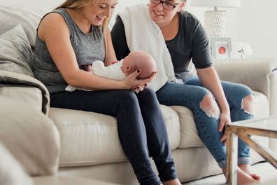 Two women with baby