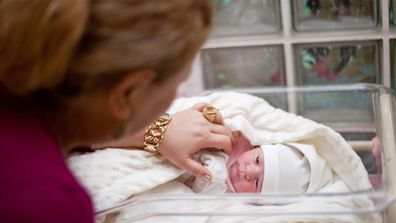 Grandma with newborn baby.