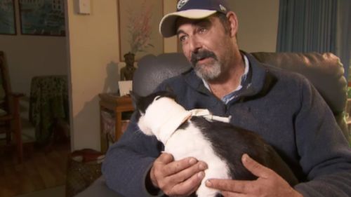 Grant Craigen with his beloved cat, Eddie. (9NEWS)