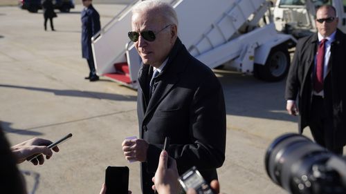 President Joe Biden speaks with members of the press after stepping off Air Force One at Hagerstown Regional Airport in Hagerstown, Md., Saturday, Feb. 4, 2023, en route to Camp David for the weekend. 