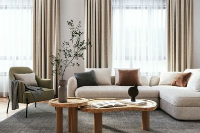Living room interior design- 3d render beige, brown  and green colored furniture and wooden elements