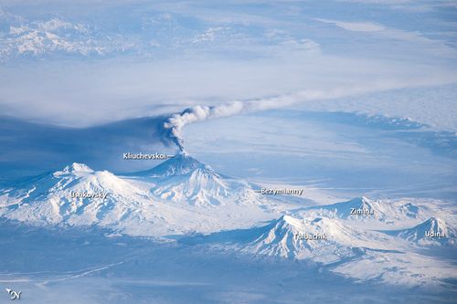 Astronauts on the International Space Station took this image of an eruption plume emanating from Klyuchevskoy, one of the many active volcanoes on the Kamchatka Peninsula. Bezymianny can be seen to the south.