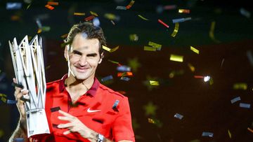 Roger Federer celebrates his win over Gilles Simon in the Shanghai Tennis Masters in China. (AAP)