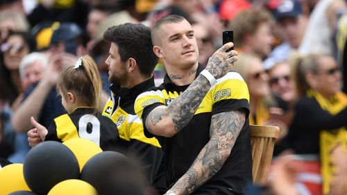Man of the moment Dustin Martin soaks up the atmosphere. (AAP)