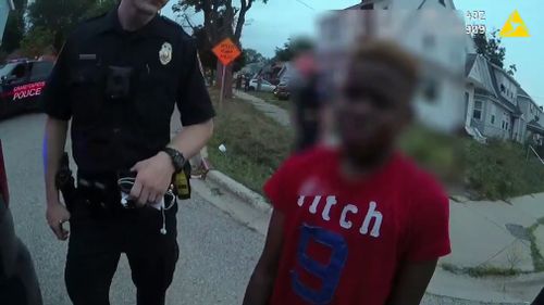 The video shows one of the boys being ordered onto his knees by police and weeping as he is handcuffed.