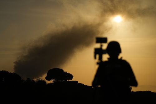 Smoke rises following an Israeli airstrike in the Gaza Strip, as seen from southern Israel, Thursday, Oct. 26, 2023.