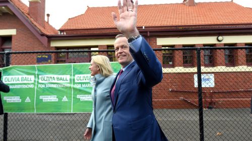 Leader of the Opposition Bill Shorten and Chloe Shorten leave after voting at Moonee Ponds. (AAP)