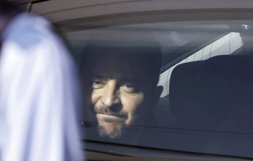 Ukraine's President Volodymyr Zelenskyy is seen in a motorcade vehicle on his way to attend the Group of Seven (G7) nations' meetings Saturday, May 20, 2023, in Hiroshima, western Japan.