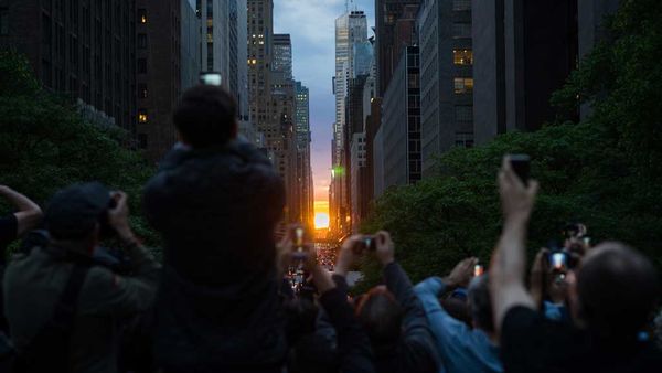 New Yorkers line the streets to capture Manhattanhenge. May 29, 2018