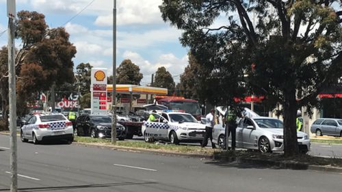 Man arrested after stolen car driven through Melbourne shopping centre