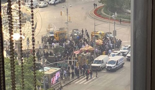 The evacuated staff from the CNN building after the bomb was found in the mail.